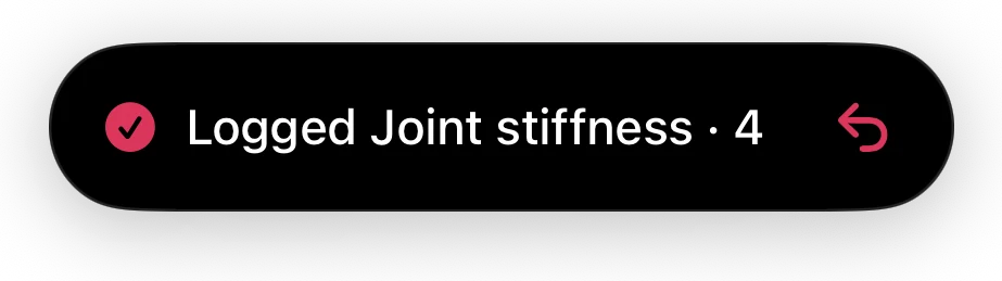 The black drop at the top of the screen after a quick log: a check mark, “Logged Joint stiffness · 4” and an Undo button.