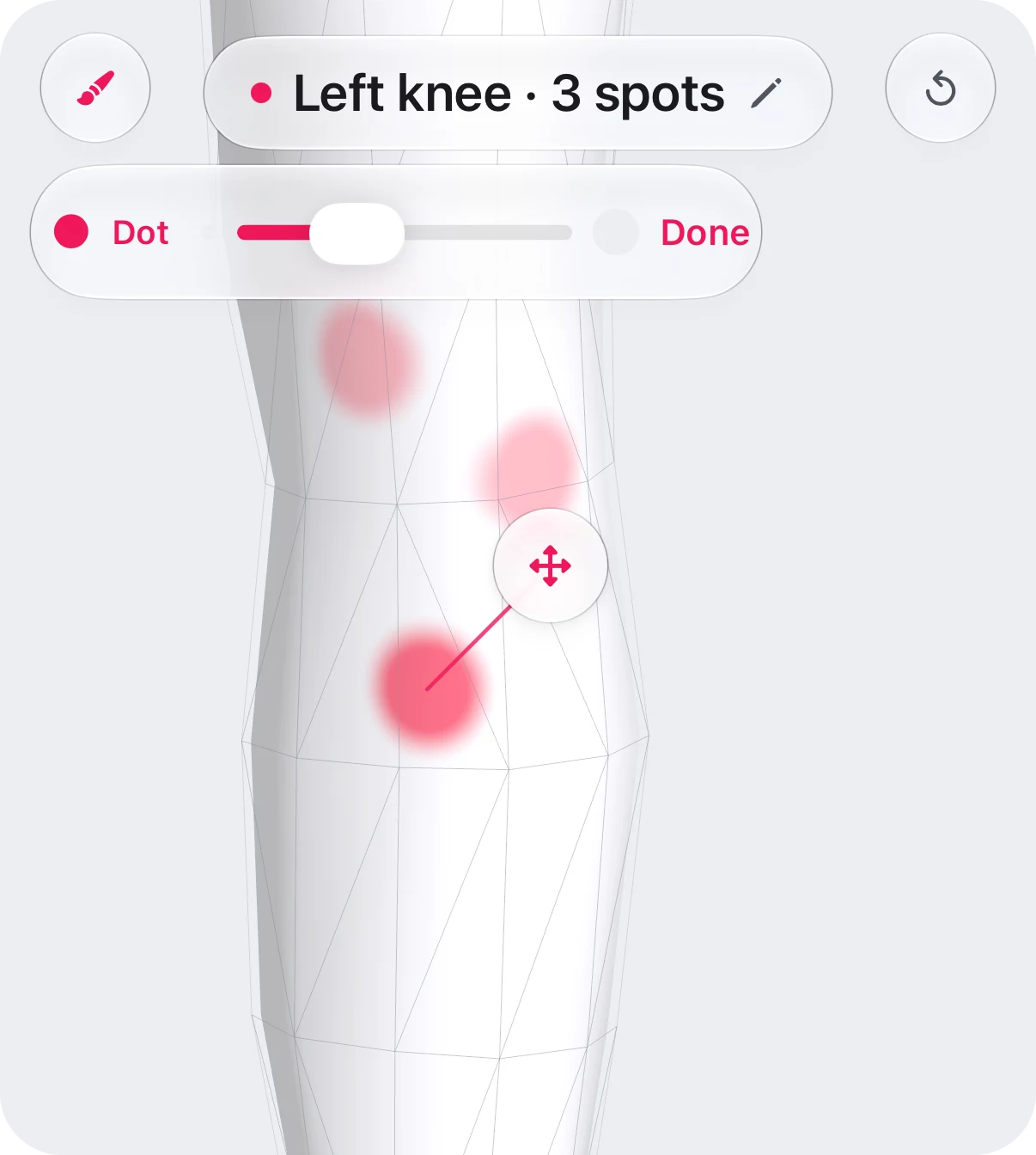 The area picker in Dot mode on the left knee: three separate dots, the dot-size slider, and the top bar naming the newest one “Spot on left knee 3”.